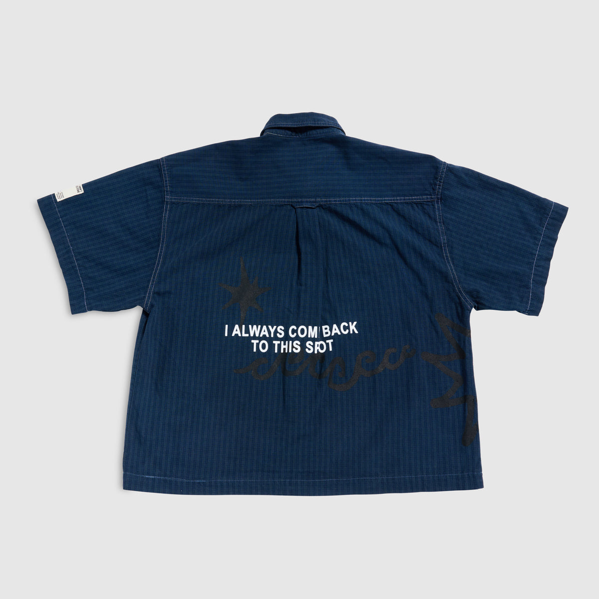 CAPSULE 01 BUTTON DOWN