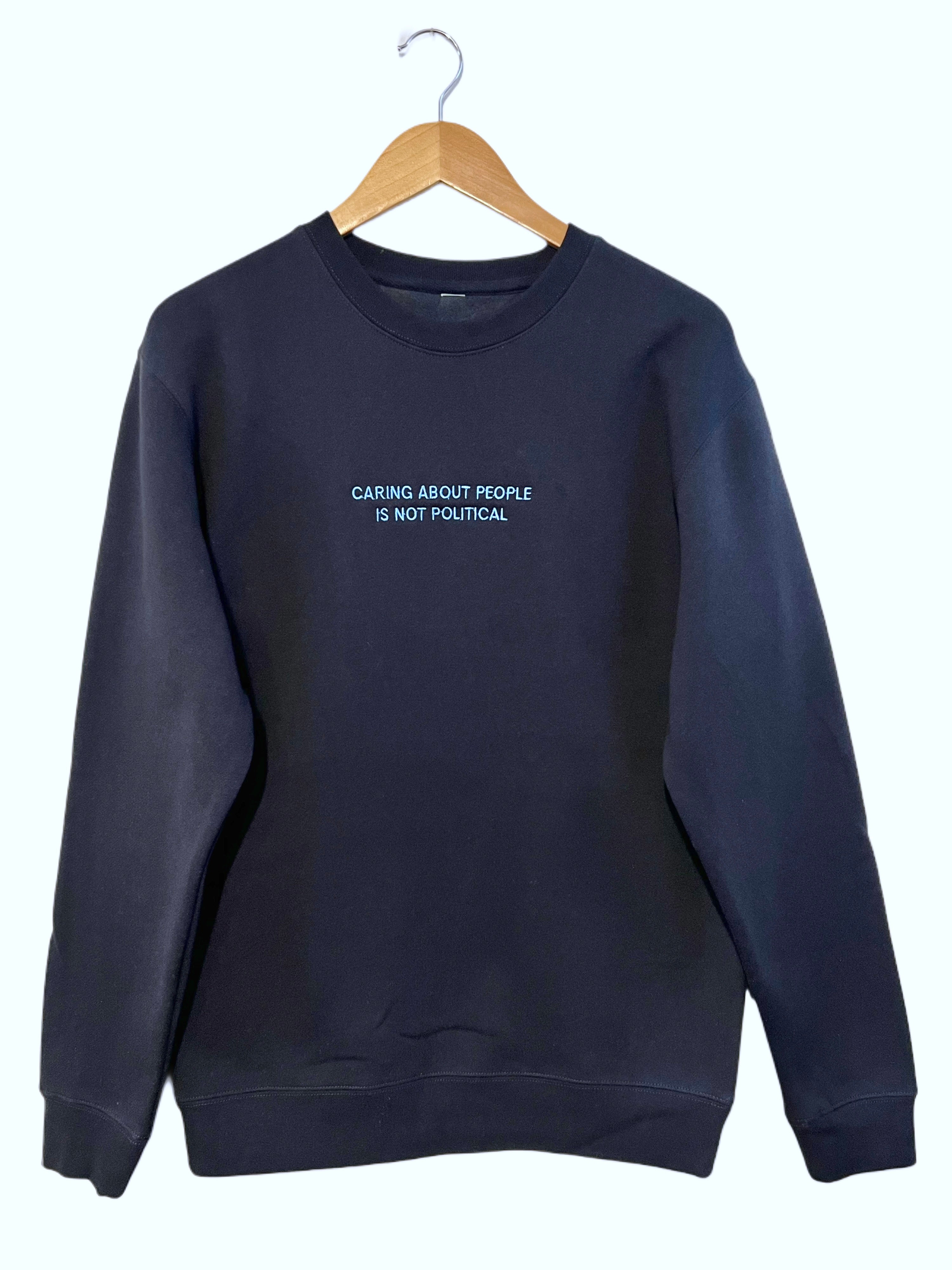 CARING CREWNECK